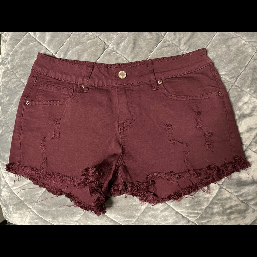 Maroon distressed jean shorts